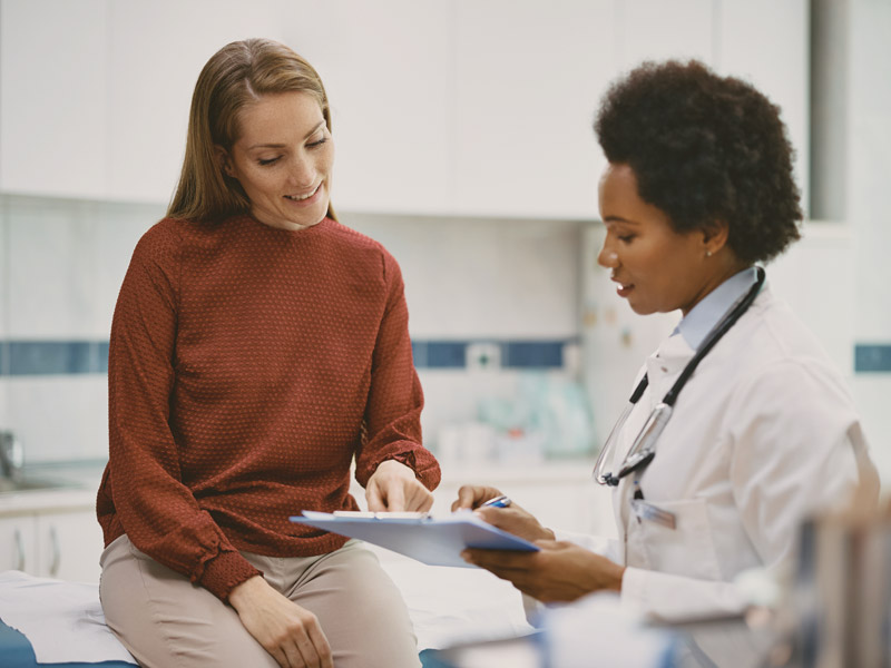 woman meeting with doctor